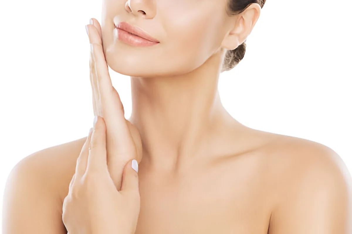 Miami woman Moisturizing and Massaging Cheek By Hand