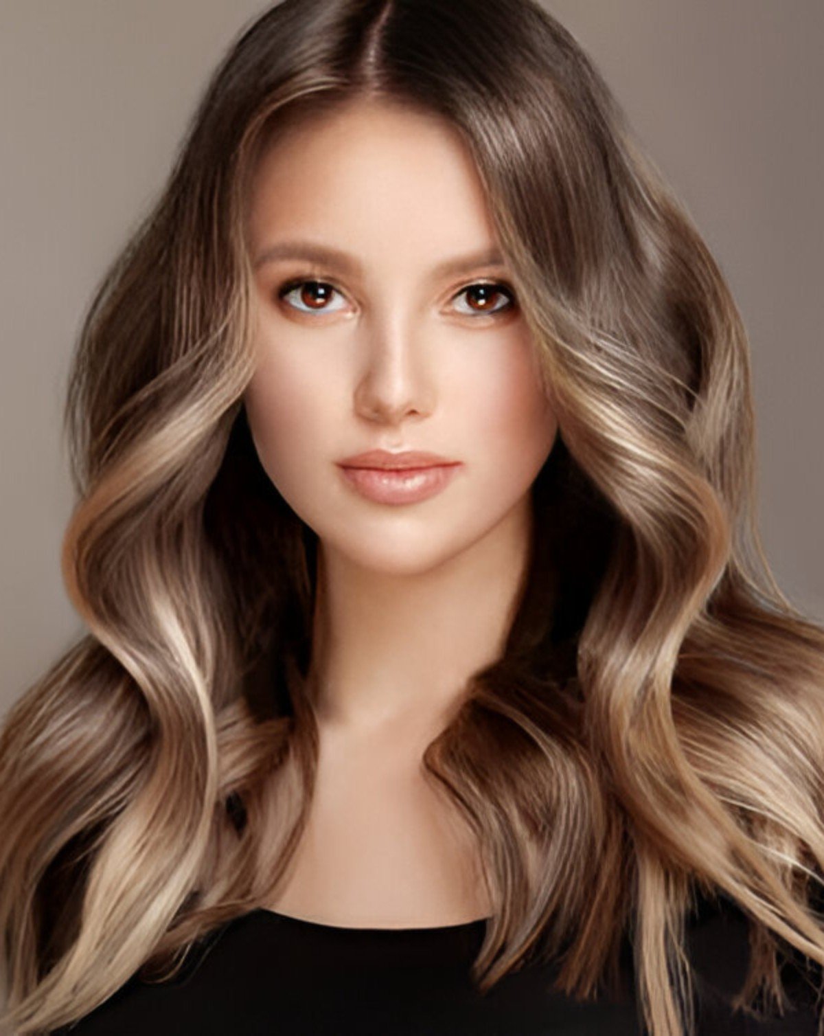 brown haired beautiful woman with wavy hair